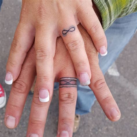 tattoo finger ring|best ring finger tattoos.